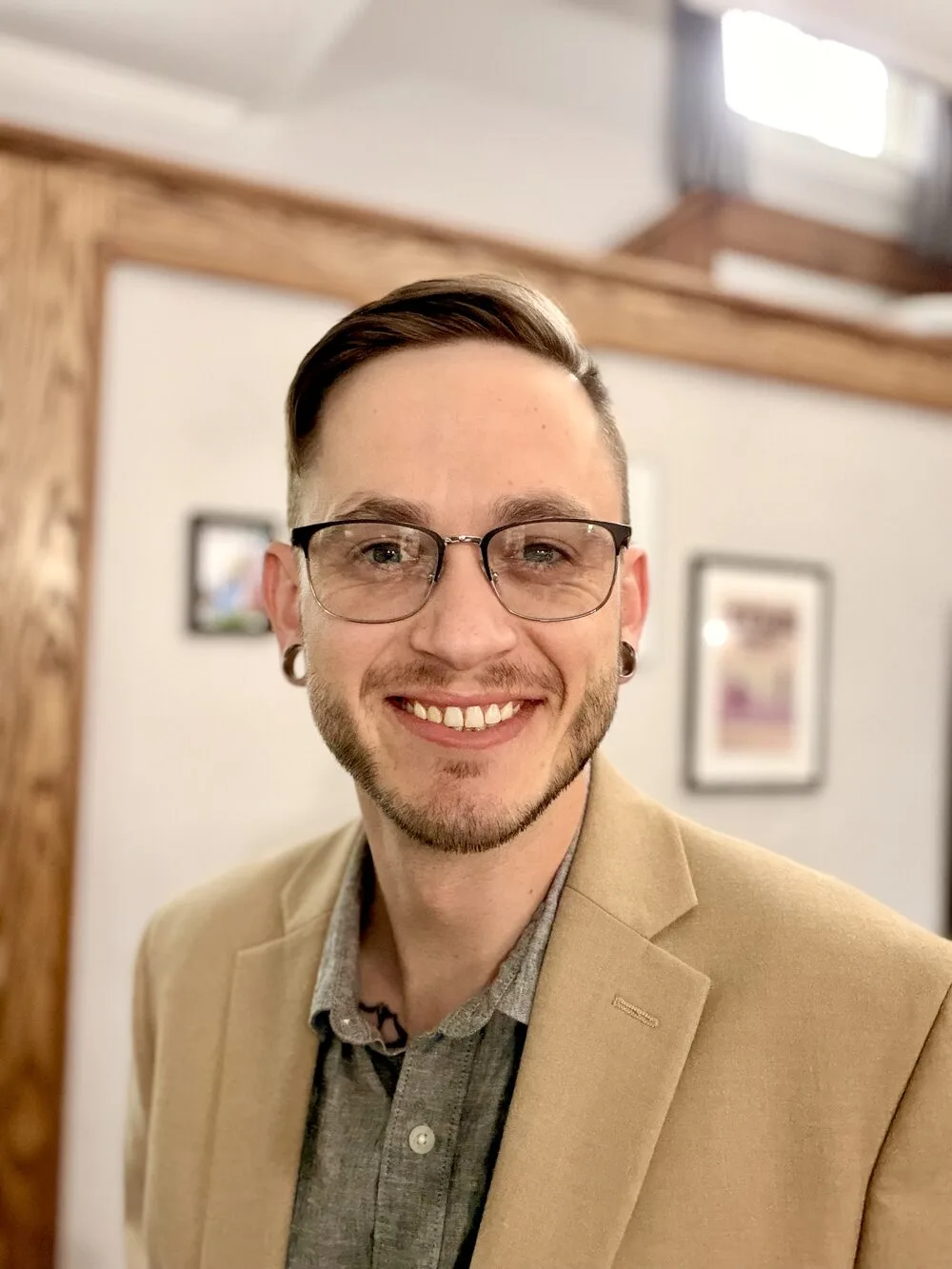 Portrait of Josiah Moore, founder and hospitality coach of The Finishing Touch Co.
